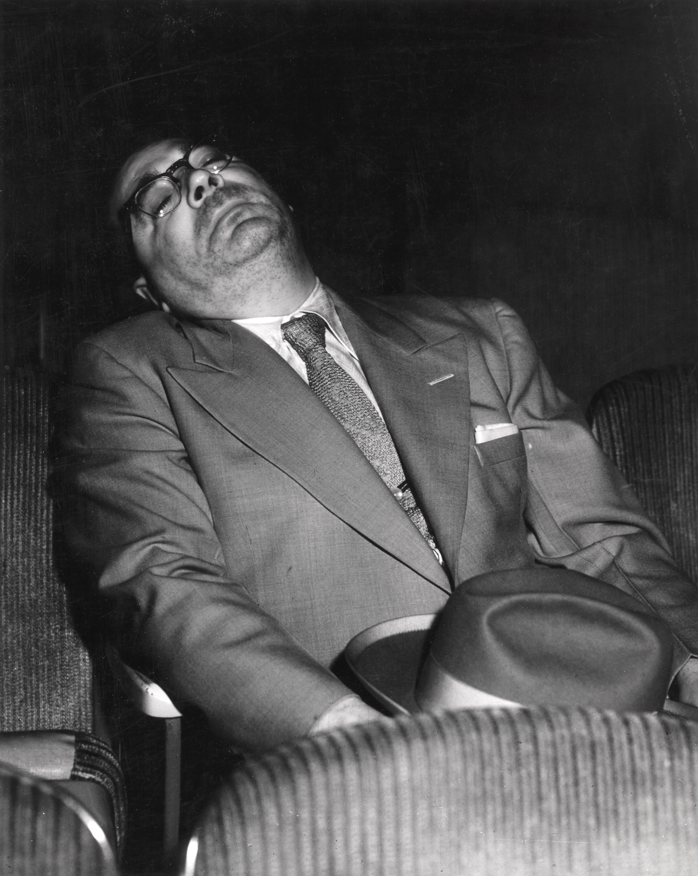 DOZING: Sleeping at the Movies, ca. 1943. © Weegee/ International Center of Photography