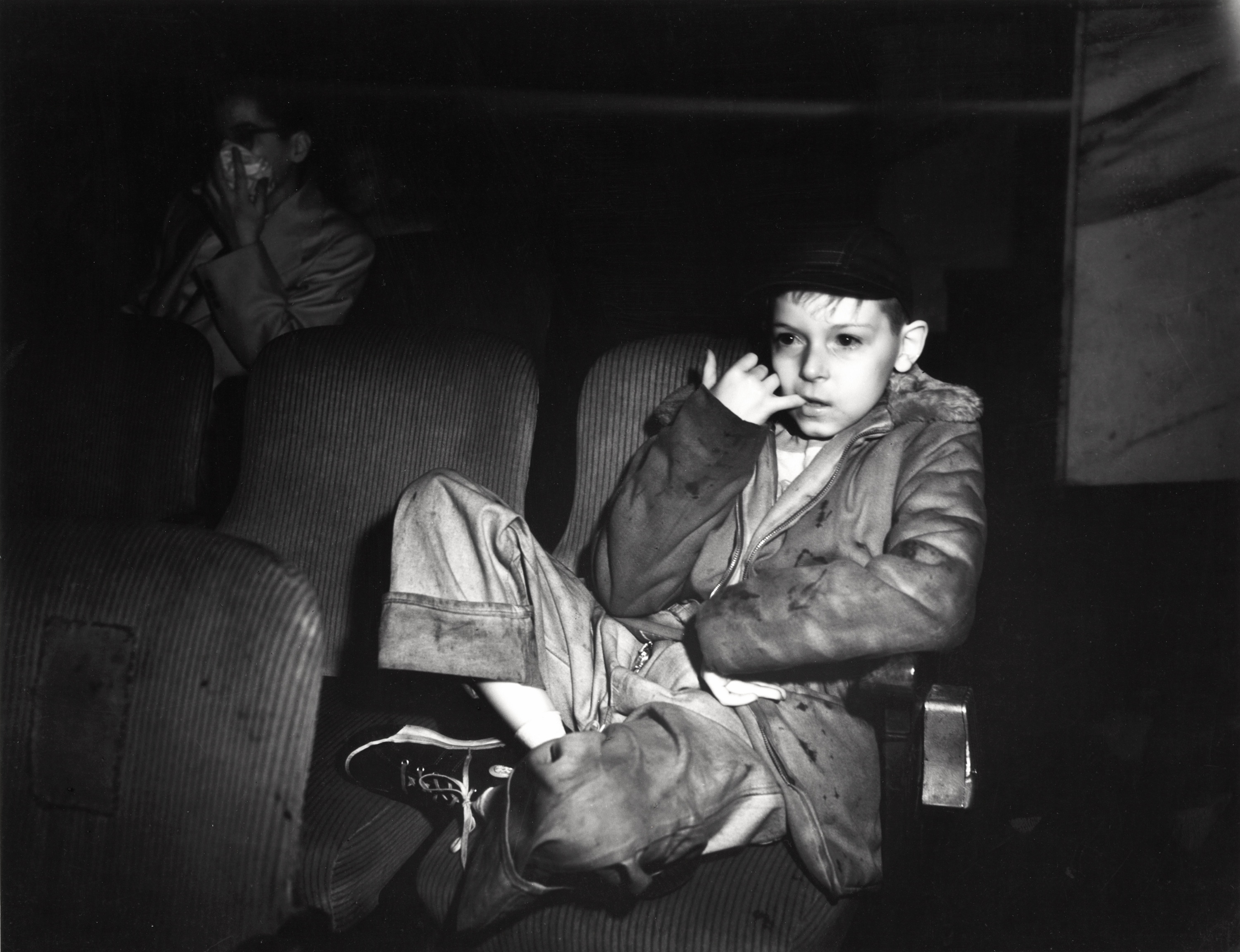 WATCHING: Boy with finger in his mouth, New York, ca. 1943. © Weegee/ International Center of Photography