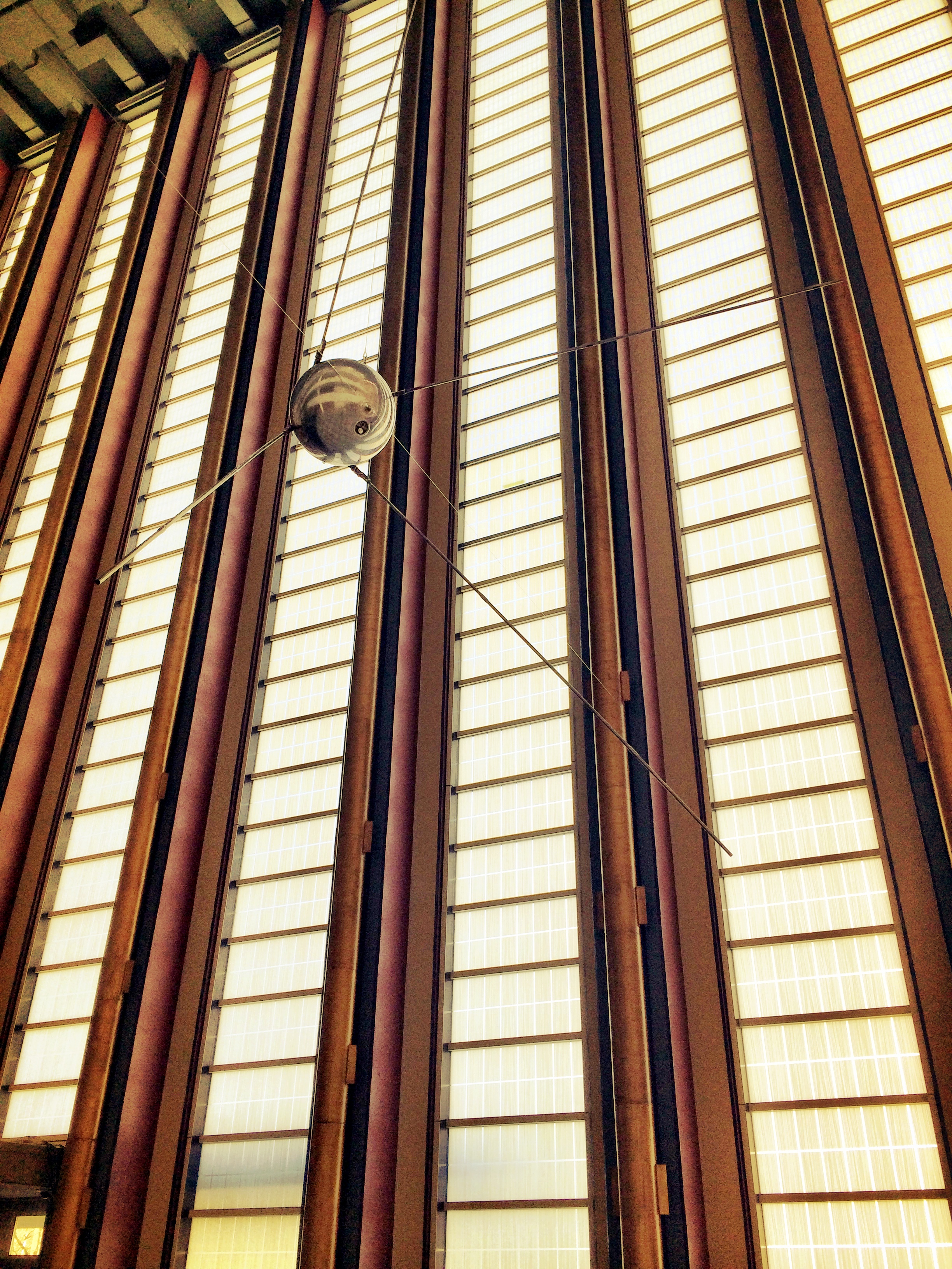SPACE AGE...a model of Sputnik hangs by the windows of entrance lobby