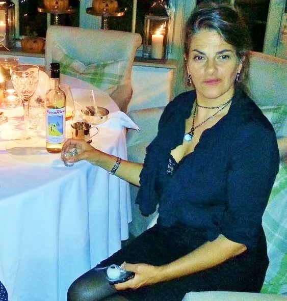 FAN...artist Tracey Emin with Cleo's AquaRiva, whose label was painted by an art student