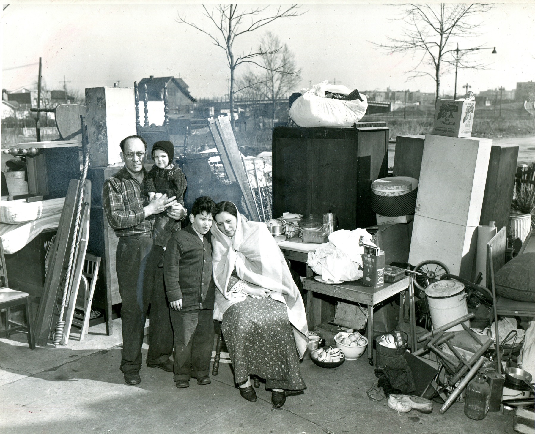 ON THE STREET...Irving Haberman's shot of an evicted family