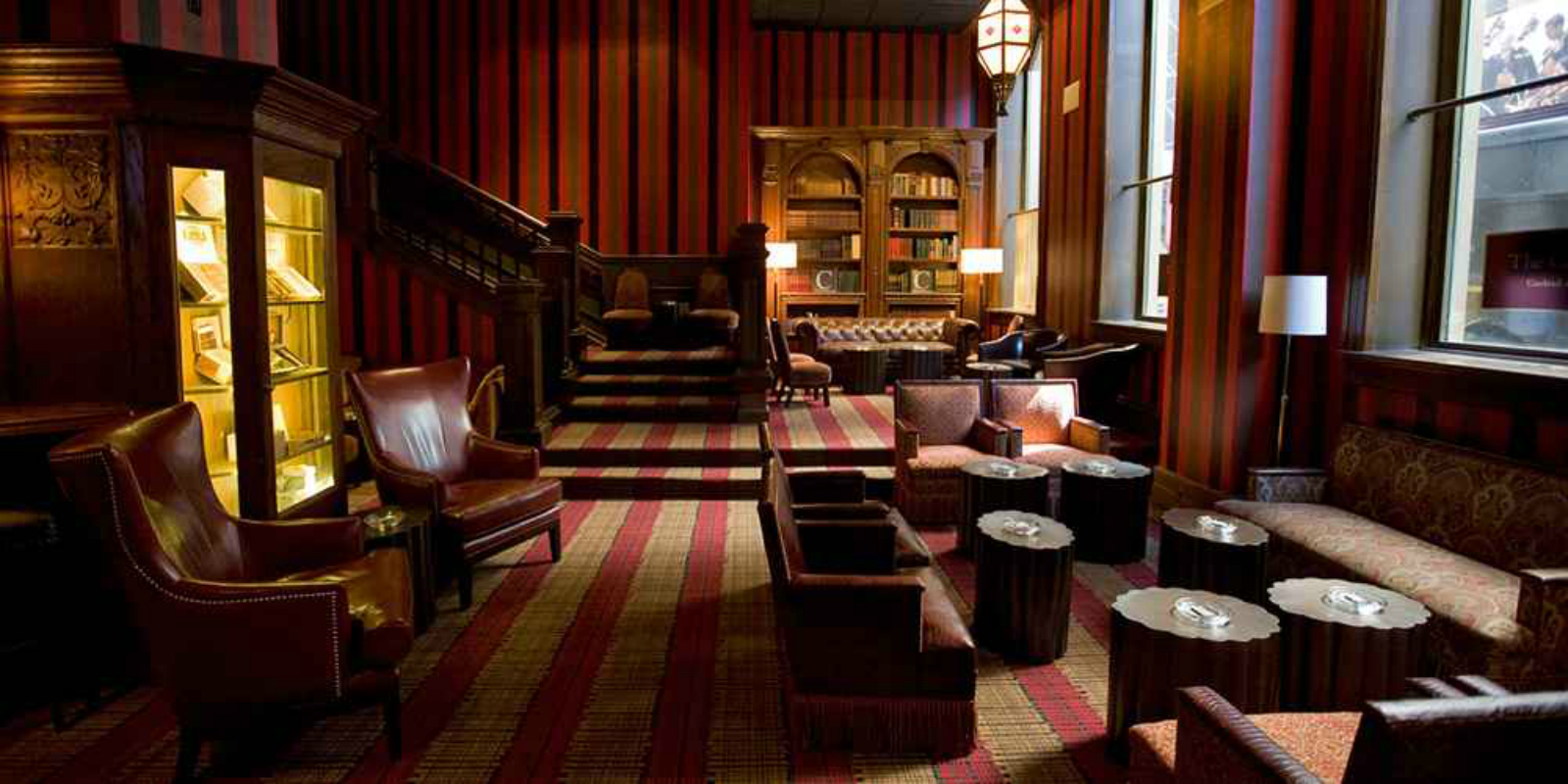 DIFFERENT STRIPE...Carnegie Club has cigars - and a roaring fire