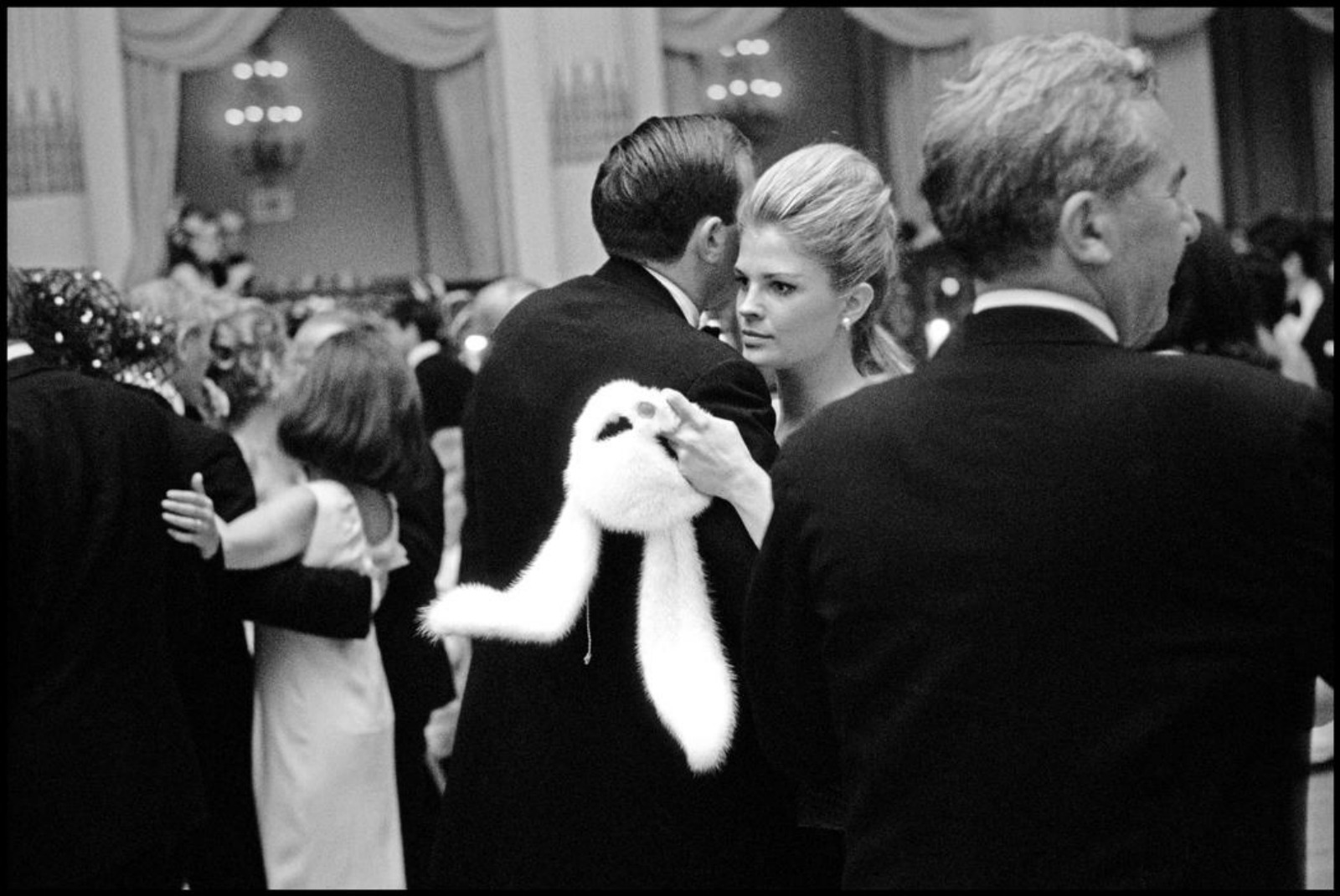 FACE-OFF...Candice Bergen takes a break from the mask at Capote's ball